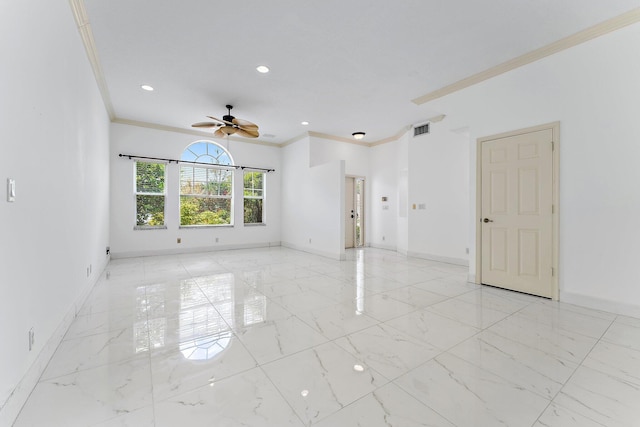 empty room with ceiling fan and crown molding