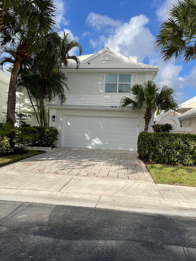 view of front of home with a garage