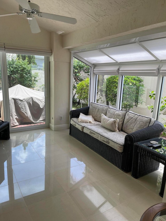 sunroom / solarium with ceiling fan