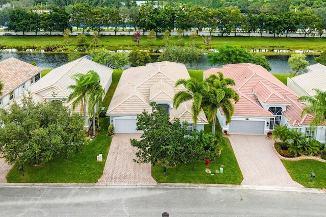 bird's eye view with a water view