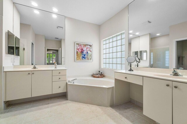 bathroom with vanity, separate shower and tub, and tile patterned flooring