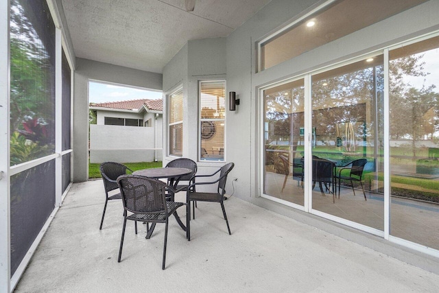 9587 Positano Way, Lake Worth, FL 33467 - sunroom / solarium with outdoor dining space