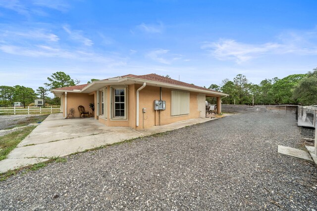 exterior space with a patio area