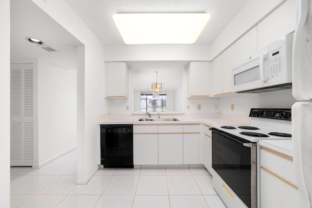6093 Pointe Regal Cir Unit 106, Delray Beach, FL 33484 - kitchen featuring black dishwasher, electric range oven, a sink, white microwave, and light countertops