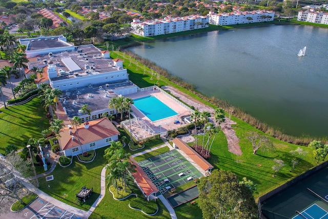 6093 Pointe Regal Cir Unit 106, Delray Beach, FL 33484 - drone / aerial view of a nearby body of water, a pool area, and apartment complex / building