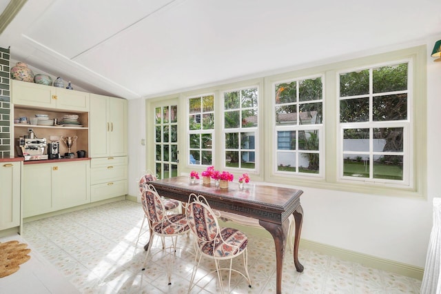 sunroom with vaulted ceiling