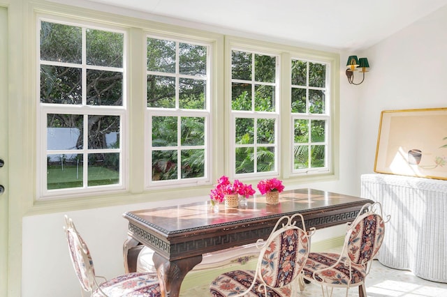 sunroom with plenty of natural light