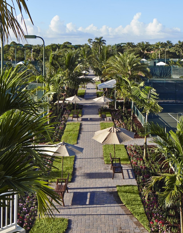 view of property's community featuring a patio area