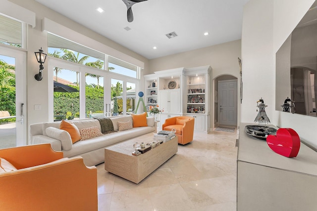 living room featuring ceiling fan