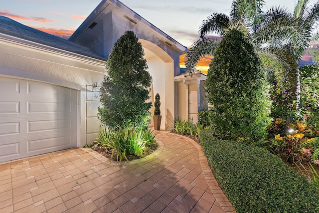 exterior space with a garage