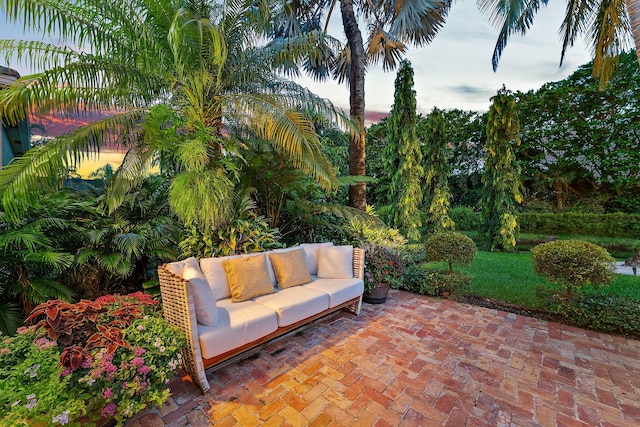 patio terrace at dusk with outdoor lounge area