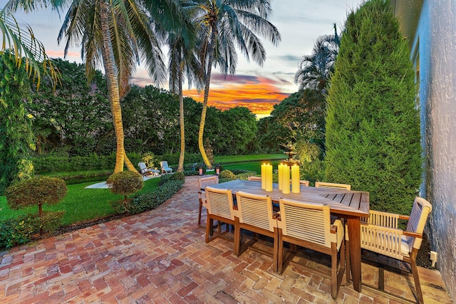 view of patio terrace at dusk