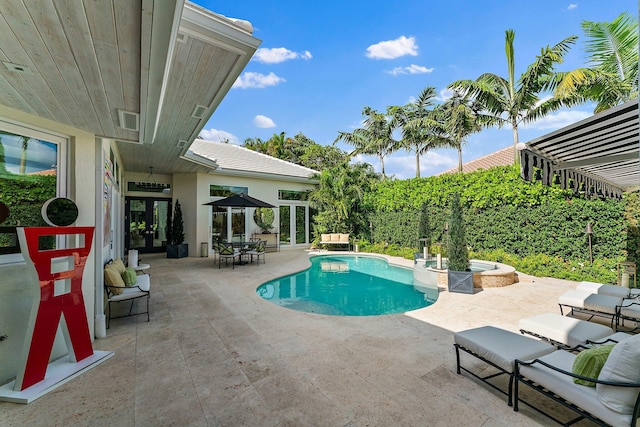 view of pool with a patio area