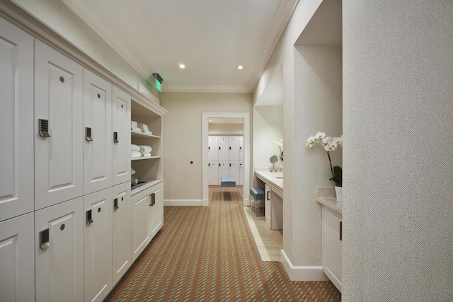 mudroom featuring ornamental molding