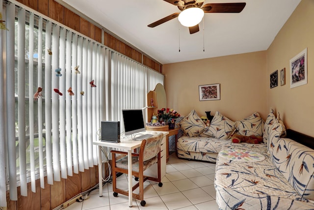 office area with a healthy amount of sunlight, light tile patterned floors, and ceiling fan