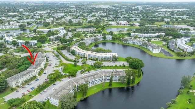 drone / aerial view with a water view