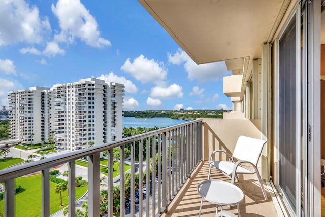 balcony featuring a water view