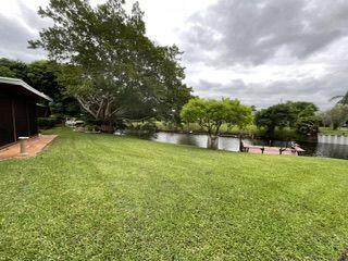 view of yard with a water view