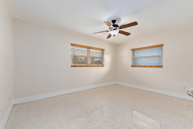 spare room featuring ceiling fan