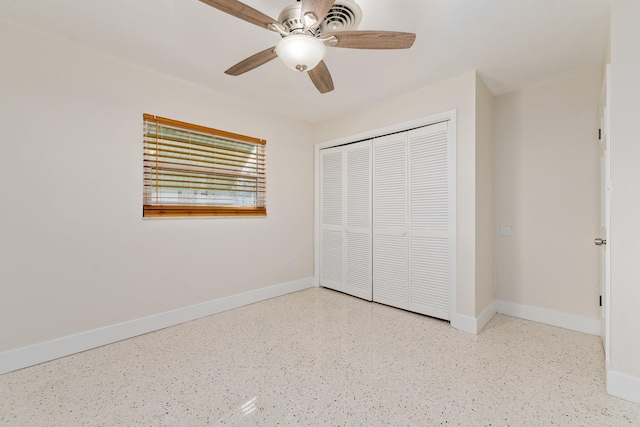 unfurnished bedroom featuring a closet and ceiling fan