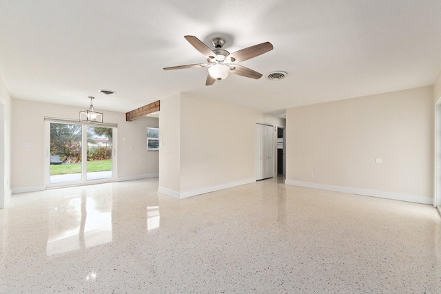 interior space with ceiling fan