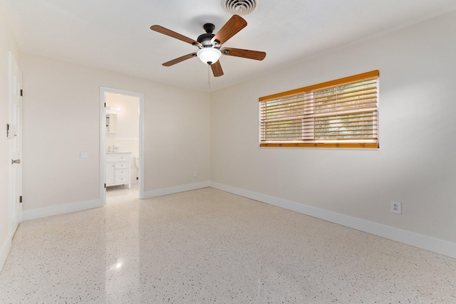 empty room featuring ceiling fan