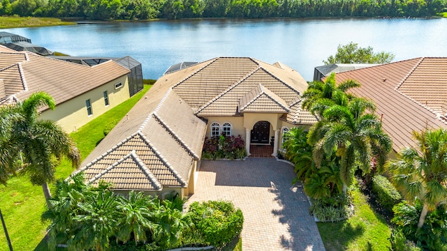 birds eye view of property featuring a water view