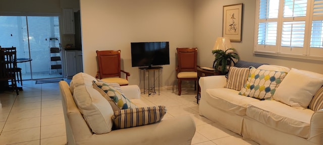 living area featuring tile patterned floors