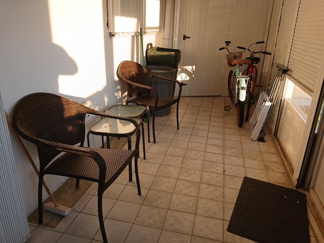 sitting room with light tile patterned floors