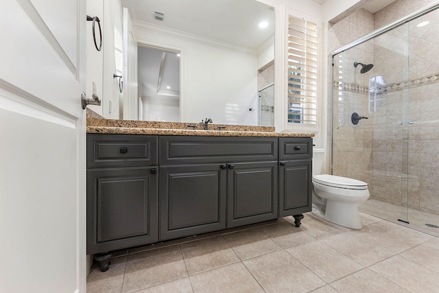 bathroom featuring tile patterned floors, walk in shower, ornamental molding, vanity, and toilet