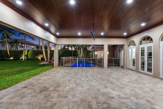 view of patio / terrace featuring french doors and a pool