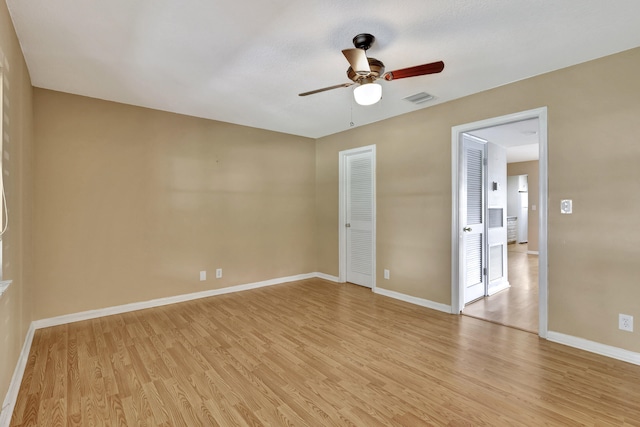 unfurnished bedroom featuring ceiling fan and light hardwood / wood-style flooring