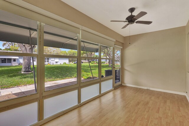 515 High Point Dr Unit B, Delray Beach, FL 33445 - unfurnished sunroom with ceiling fan