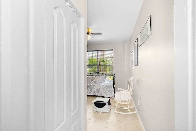 interior space featuring ceiling fan