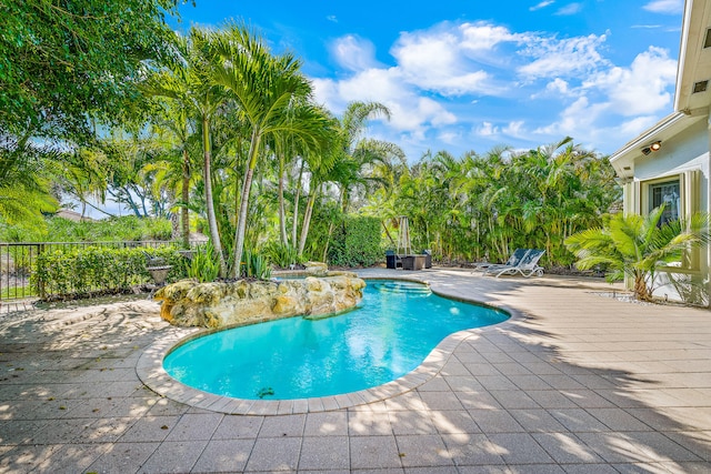 view of swimming pool featuring a patio