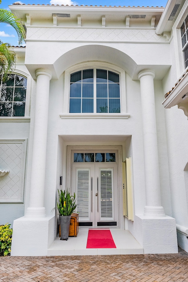 doorway to property featuring french doors