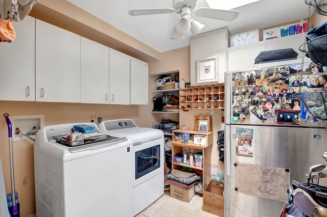 clothes washing area featuring washer and dryer, cabinets, light tile patterned floors, and ceiling fan