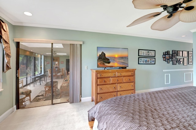 bedroom featuring crown molding, a closet, light colored carpet, and ceiling fan