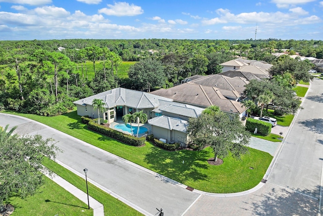 bird's eye view with a view of trees
