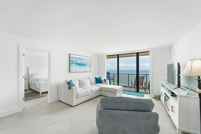 living room with floor to ceiling windows