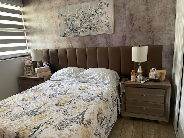 bedroom featuring hardwood / wood-style floors