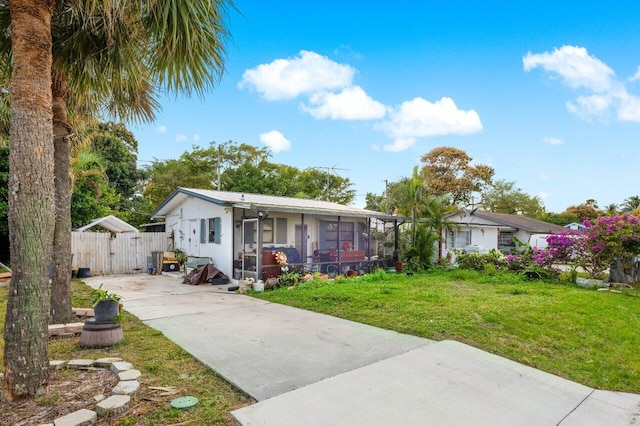 view of front of house with a front lawn