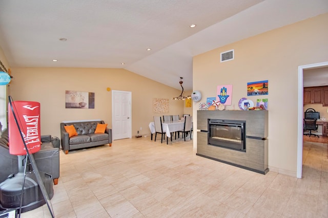 living room with lofted ceiling