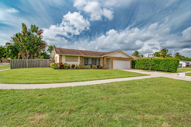 ranch-style home featuring a front yard and a garage