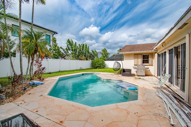 view of pool with a patio