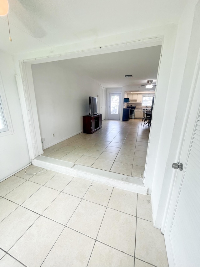 interior space featuring light tile patterned flooring