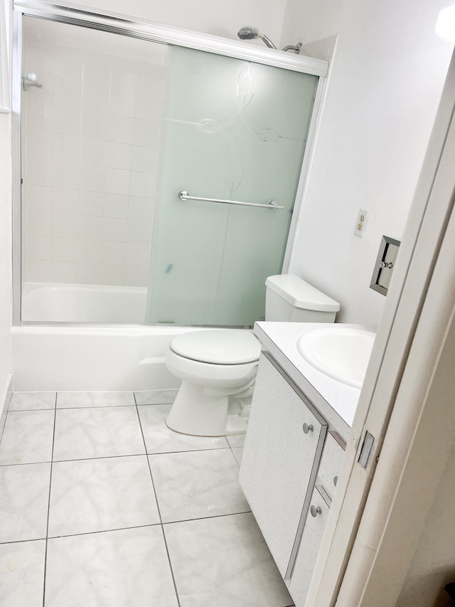 full bathroom with tile patterned floors, vanity, toilet, and shower / washtub combination