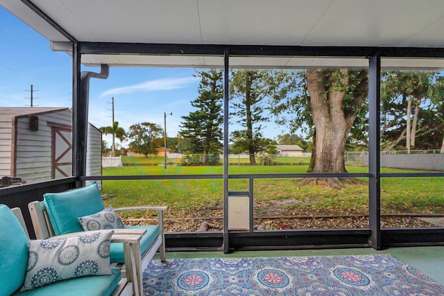 unfurnished sunroom featuring a healthy amount of sunlight