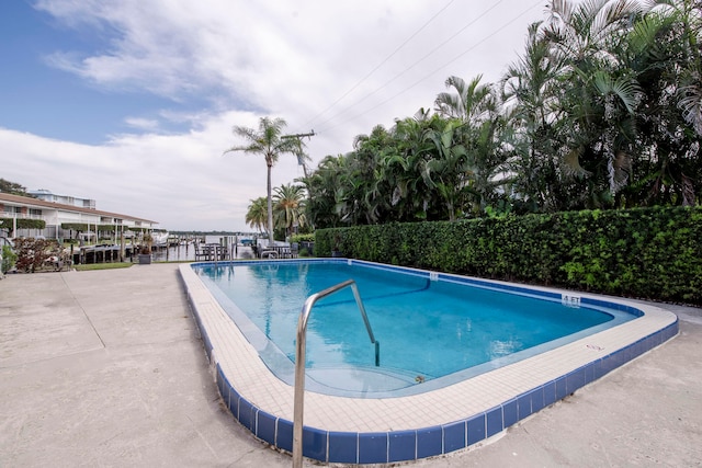 view of pool featuring a patio