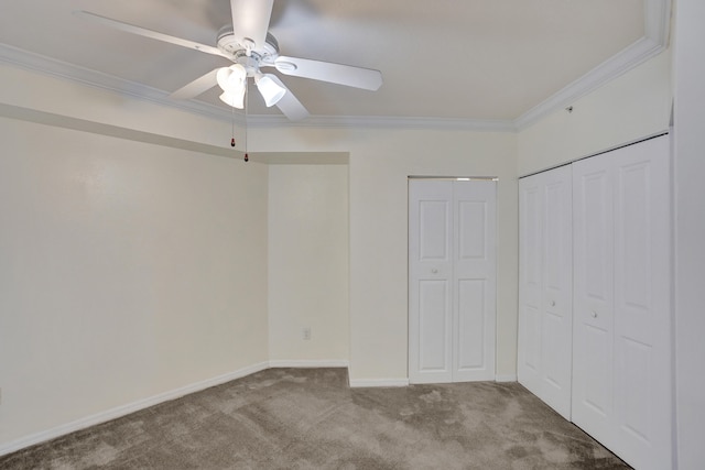 unfurnished bedroom with crown molding, light colored carpet, and ceiling fan